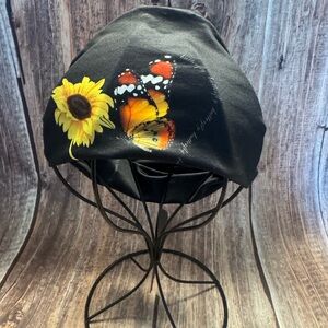 Never Worn Black Headband with Butterfly and Sunflower Design Item #PHK6640